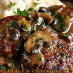Bobby Flay's Salisbury steak with mushroom gravy served on a plate