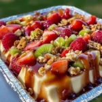 Delicious Cheesecake Fruit Salad with assorted fresh fruits and creamy cheesecake.