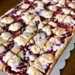Delicious cherry bars served on a platter for a crowd