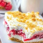 Delicious Cherry Cream Cheese Dessert served in a white bowl.