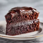 Decadent Chocolate Fudge Cake topped with chocolate ganache