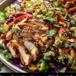 Crunchy Asian Sesame Chicken Salad with fresh vegetables and chicken