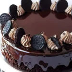Delicious dark chocolate mirror glaze poured over a cake