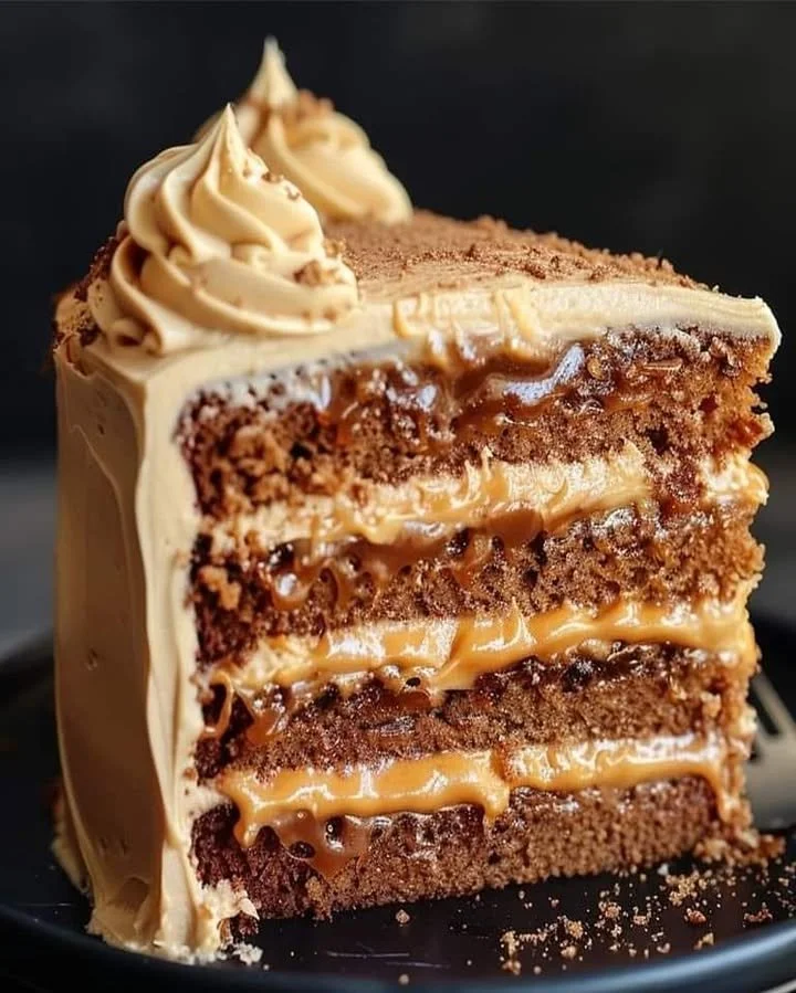Decadent Caramel Latte Cake topped with coffee buttercream and caramel drizzle