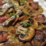 Flambéed Brandy Steak served with Mushroom Sauce on a plate