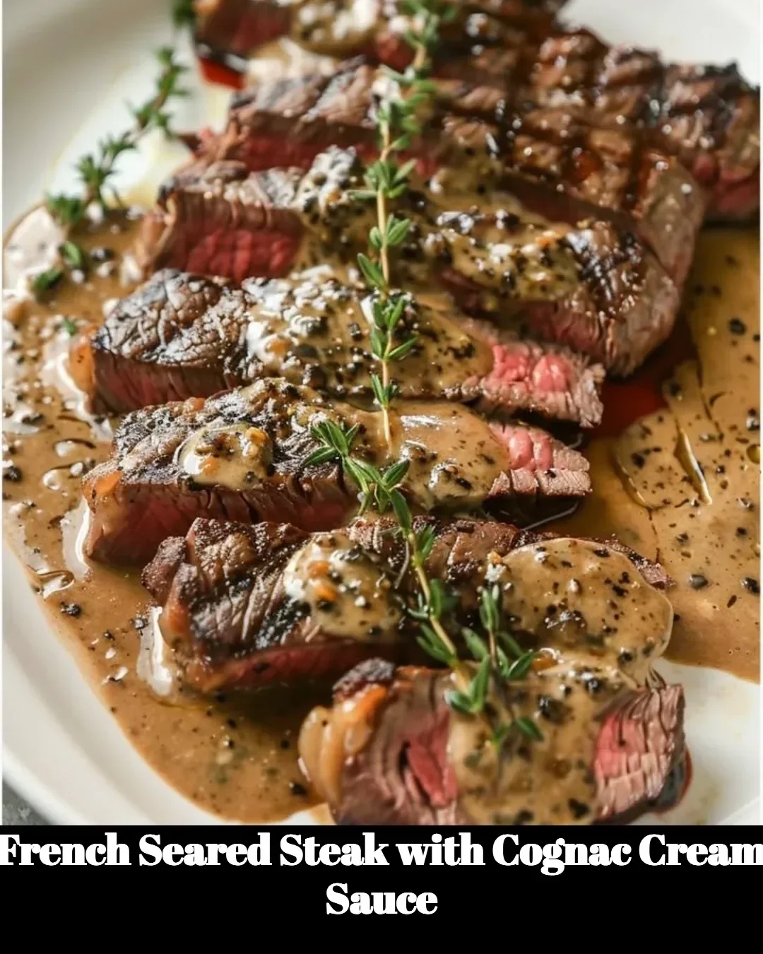 Juicy French seared steak topped with a cognac cream sauce on a plate