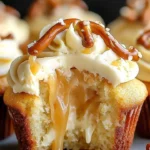 Gooey salted caramel cream cheese cupcakes topped with caramel drizzle