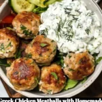 Plate of Greek Chicken Meatballs served with homemade tzatziki sauce