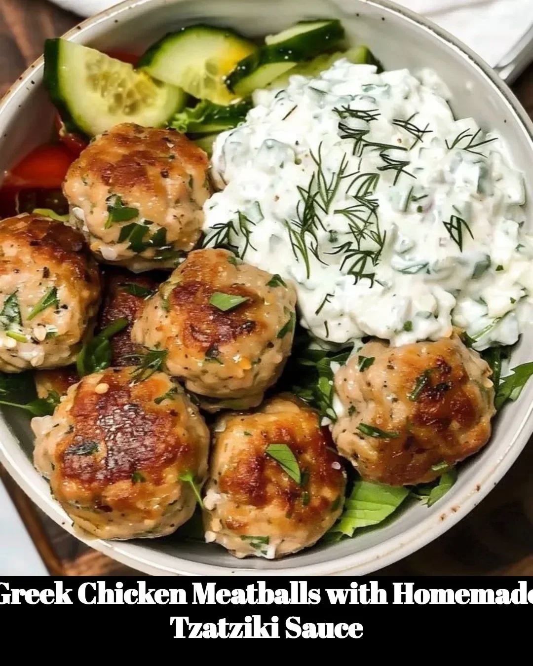 Plate of Greek Chicken Meatballs served with homemade tzatziki sauce
