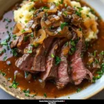 Hearty round steak served with delicious onion gravy
