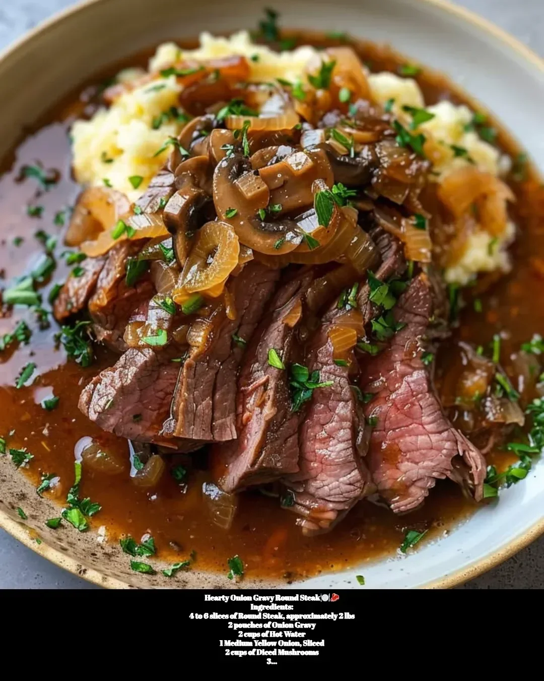 Hearty round steak served with delicious onion gravy