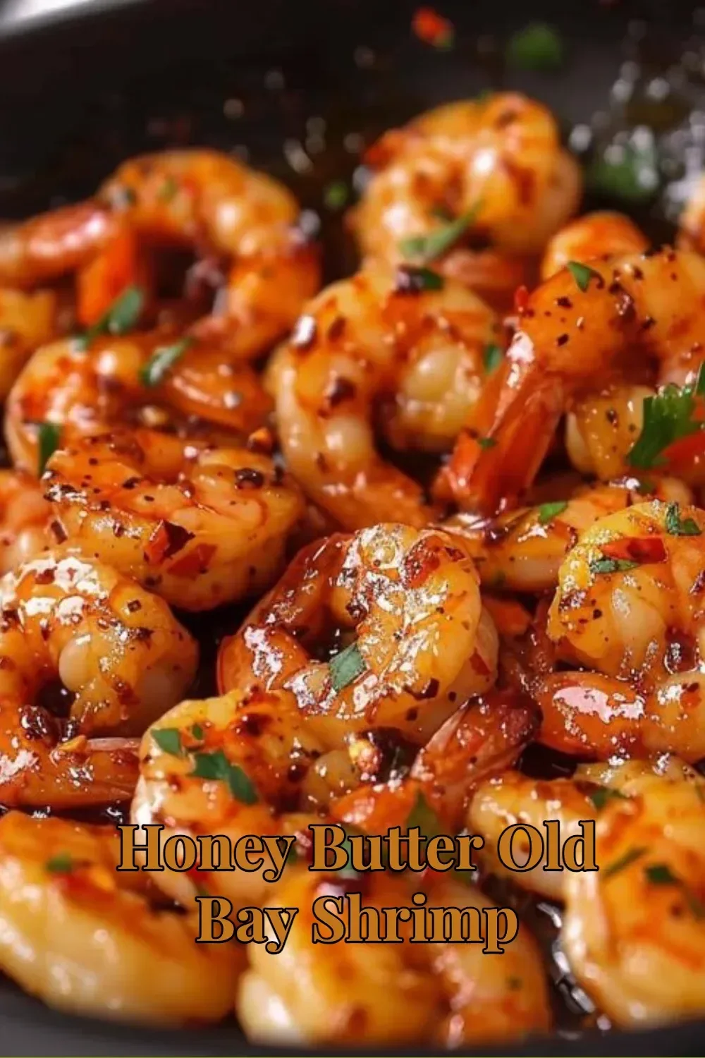 Delicious Honey Butter Old Bay Shrimp served in a bowl with garnishes