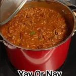 A delicious pot of homemade chilli simmering with rich ingredients.