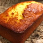 Delicious Keto Lemon Cream Cheese Loaf garnished with lemon slices