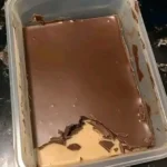 Low-carb peanut butter chocolate bars with rich chocolate topping.