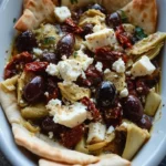 Mediterranean baked feta appetizer served with pita bread