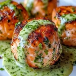 Delicious salmon balls served with a creamy avocado sauce