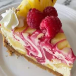 No-Bake Pineapple Raspberry Cheesecake with fresh fruit toppings
