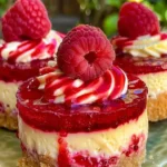 No-Bake Raspberry Lemon Swirl Cheesecake with vibrant raspberry topping