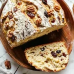 Freshly baked no-knead fruit and nut bread with nuts and dried fruits
