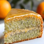 Orange Poppy Seed Cake with Citrus Glaze served on a plate