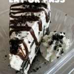 Delicious homemade Oreo Cheesecake garnished with Oreo cookies and whipped cream