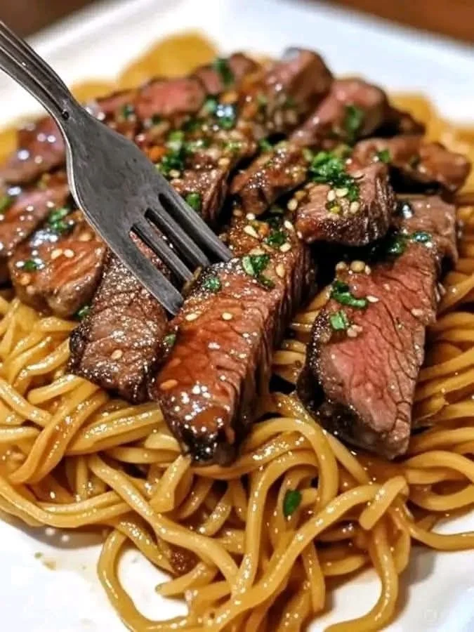 Pineapple fried chicken wings garnished with herbs and pineapple slices.