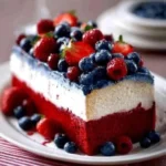 Red, White & Blue Poke Cake decorated for a festive celebration.