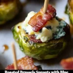Roasted Brussels sprouts topped with blue cheese and crispy bacon bites