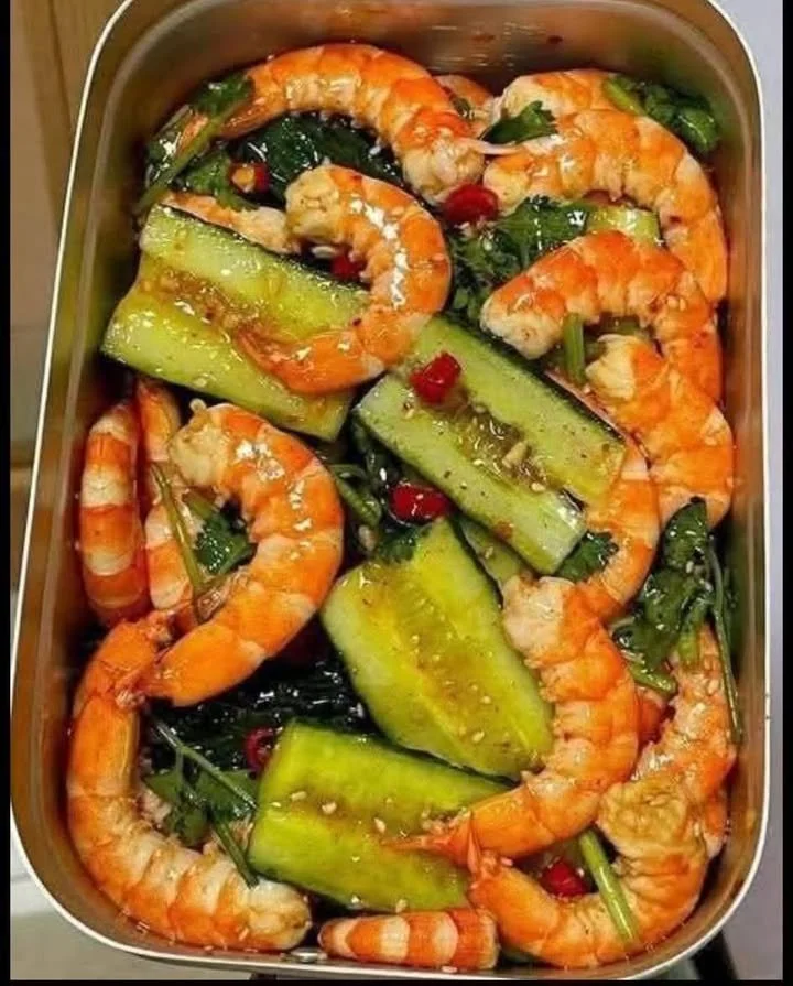 Delicious shrimp and cucumber salad served in a bowl