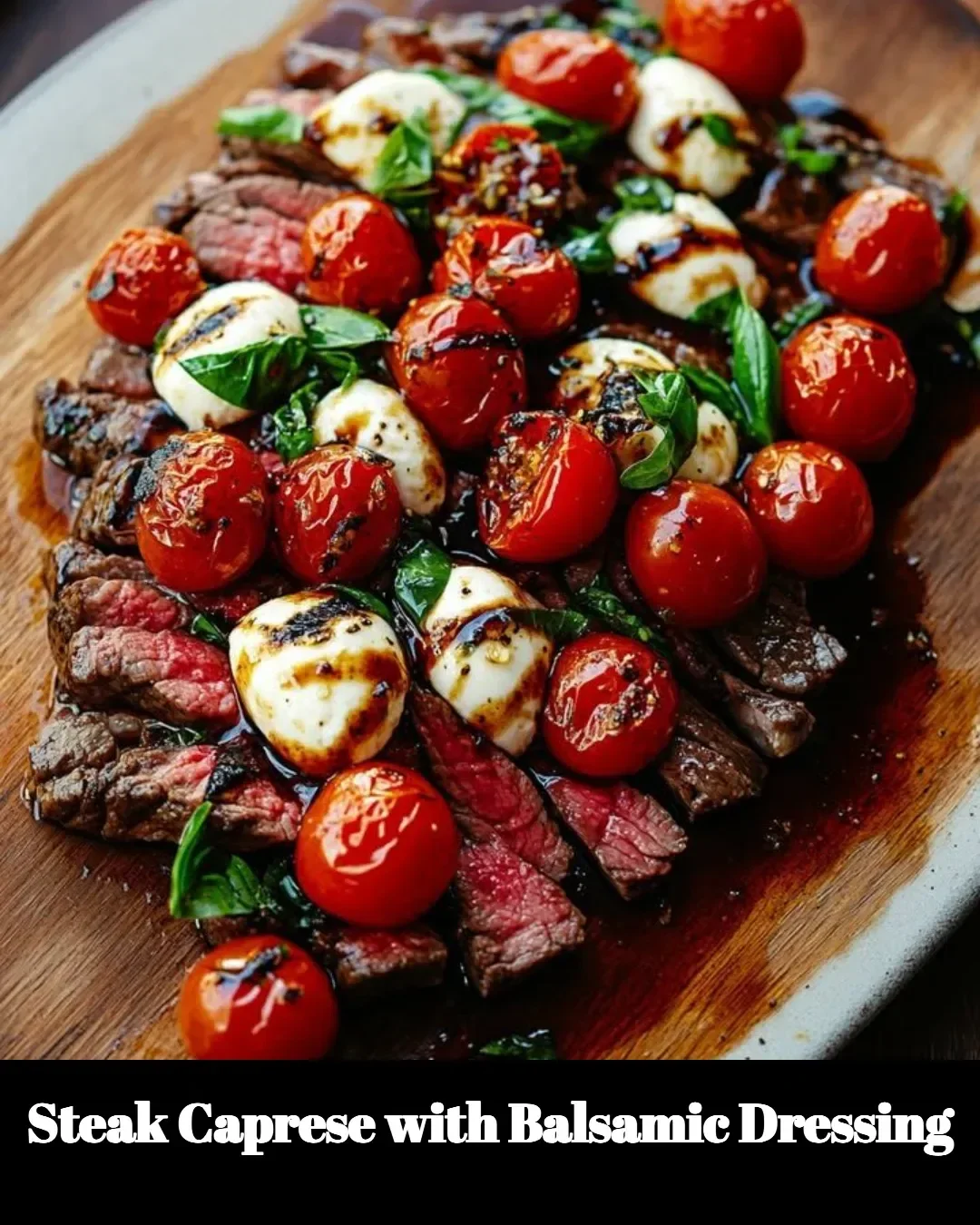Delicious steak caprese salad with balsamic dressing and fresh ingredients.