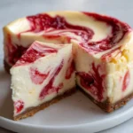 Delicious strawberry swirl Basque cheesecake garnished with fresh strawberries.