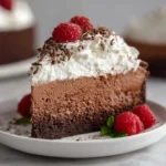 Decadent triple chocolate mousse cake with layers of rich chocolate