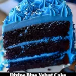 Sliced divine blue velvet cake with cream cheese frosting on a decorative plate