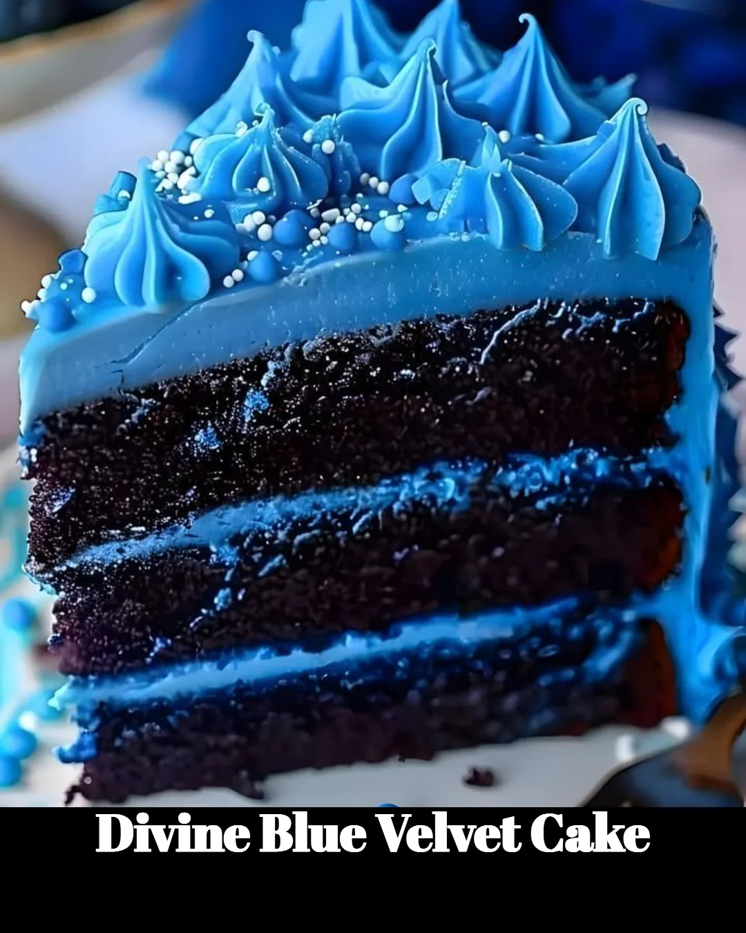 Sliced divine blue velvet cake with cream cheese frosting on a decorative plate