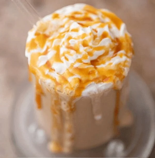 Delicious McDonald's Caramel Frappe with whipped cream and caramel drizzle