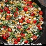 Mediterranean Lemon Rice topped with chickpeas, spinach, tomatoes, and feta cheese.