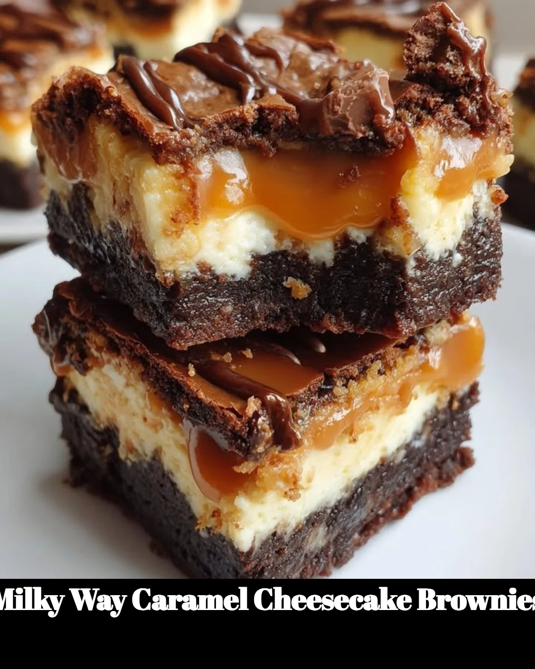 Milky Way Caramel Cheesecake Brownies topped with chocolate and caramel