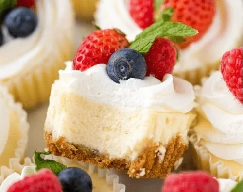 Delicious mini cheesecakes topped with fresh berries