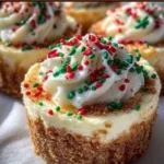 Mini Christmas Cheesecakes topped with festive decorations for holiday celebrations.