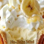 Delicious no-bake mini banana cream pies topped with whipped cream and banana slices