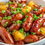 Delicious Pineapple Brown Sugar Little Smokies served as a savory appetizer