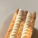 Delicious Raspberry Thousand Layers dessert with flaky pastry and raspberry filling.