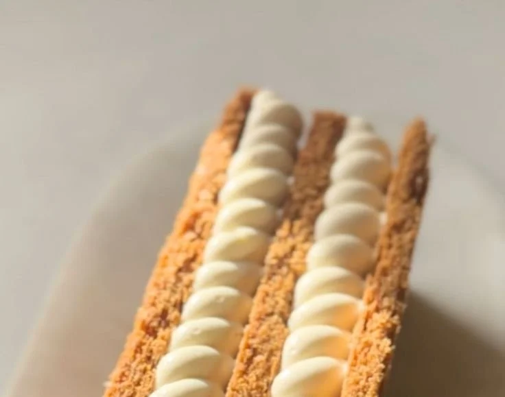 Delicious Raspberry Thousand Layers dessert with flaky pastry and raspberry filling.