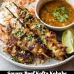 Savory beef kofta kebabs served on a platter with herbs and dipping sauce