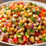 Bowl of Texas Caviar Dip served with tortilla chips