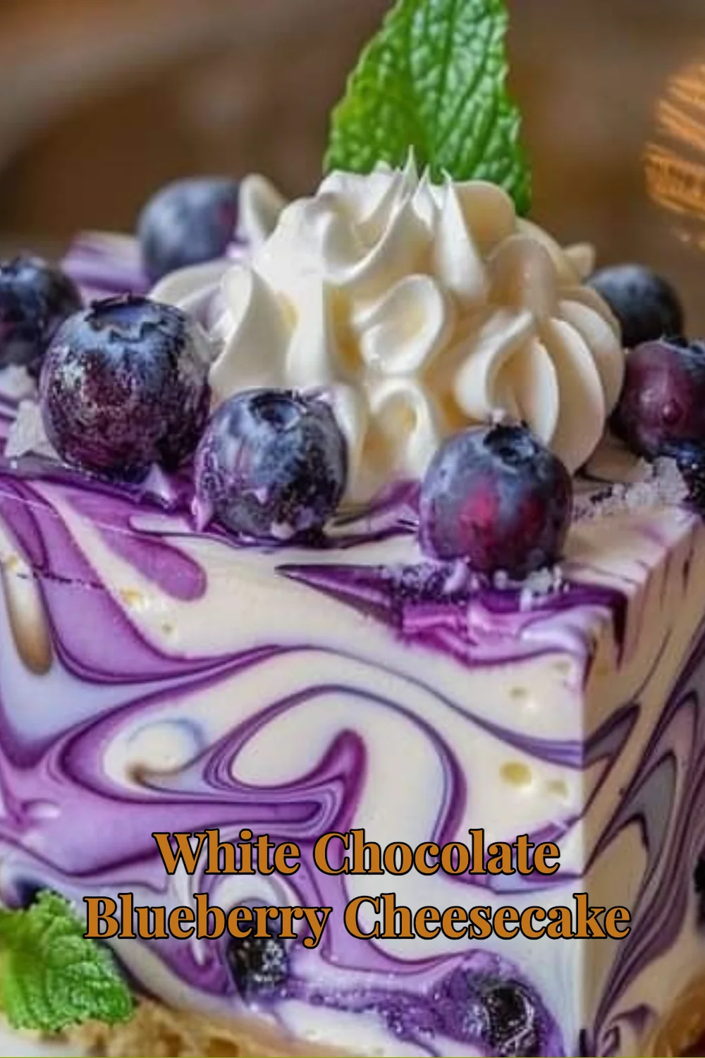 Slice of white chocolate blueberry cheesecake topped with fresh blueberries