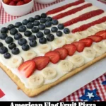 American Flag Fruit Pizza topped with fresh fruits in red, white, and blue patterns.