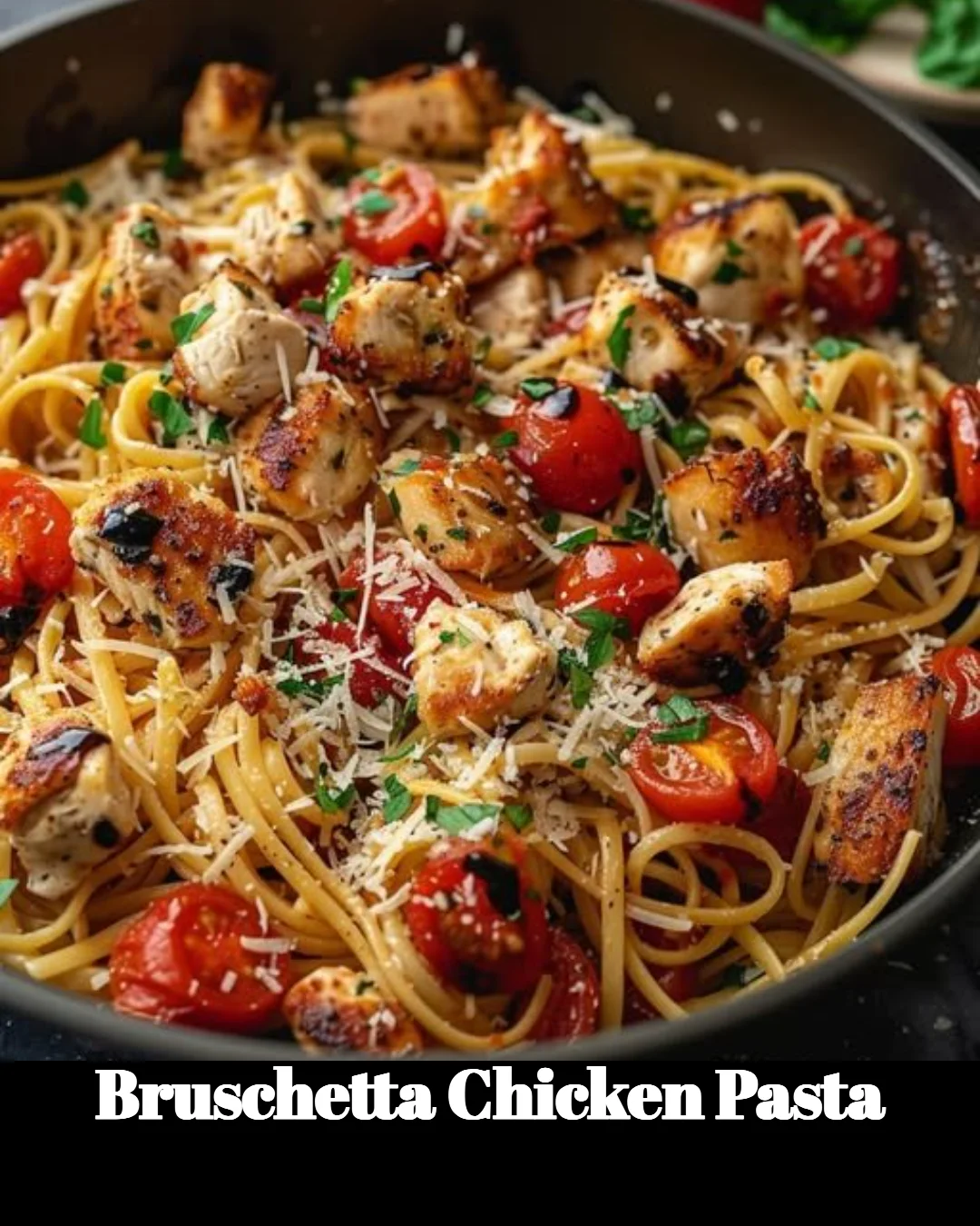 Delicious Bruschetta Chicken Pasta topped with fresh tomatoes and basil.