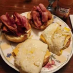 Classic bacon, egg, and cheese sandwich on a toasted bagel.